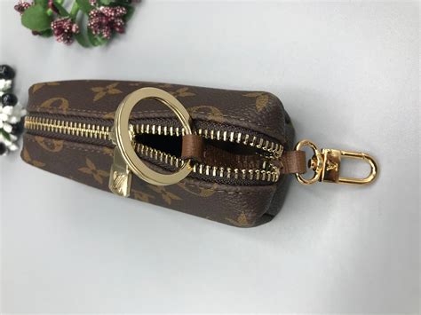 louis vuitton coin purse keychain fake|louis vuitton key case wallet.